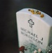 Fallen Soldier's Grave Adorned with Symbols of Remembrance
