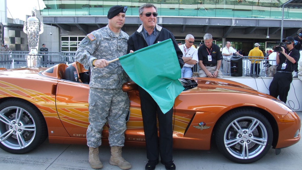 Indiana Guardsman Waves Green Flag at Indy 500 Armed Forces Day