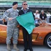 Indiana Guardsman Waves Green Flag at Indy 500 Armed Forces Day