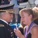 Army Chief Consoles Young Girl at Memorial Ceremony