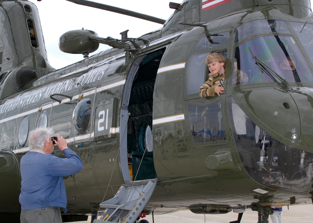 Child Gazes Out of CH-46 Sea Knight Helicopter at Joint Service Open House