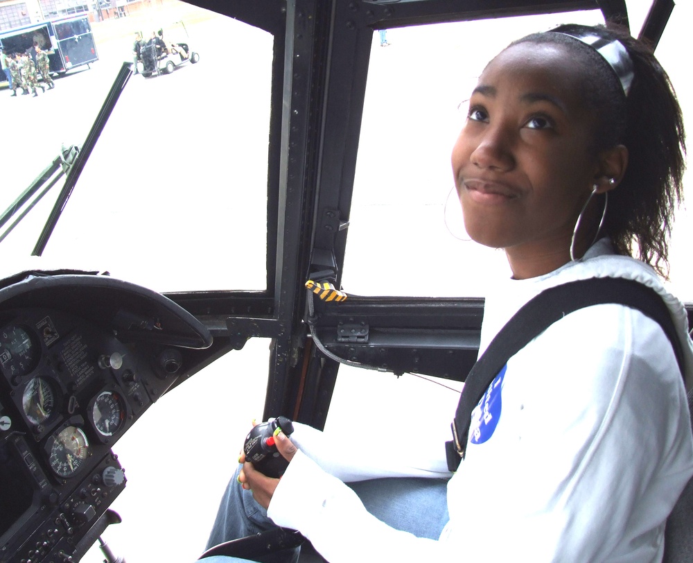 Teenager Explores Marine Corps Helicopter at Joint Service Open House