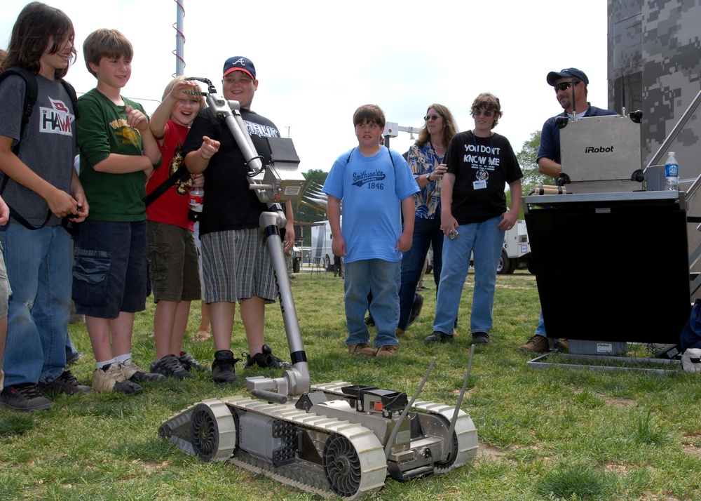 Visitors Interact with Remote-Controlled Robot on National Mall