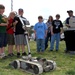 Visitors Interact with Remote-Controlled Robot on National Mall
