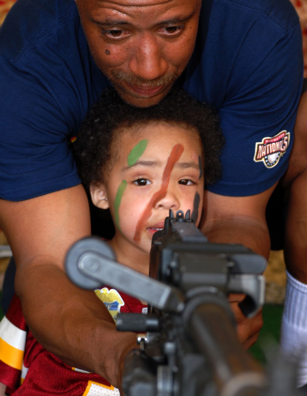 Marine Veteran Shares Military Experience with Grandson at National Exhibit