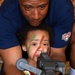 Marine Veteran Shares Military Experience with Grandson at National Exhibit
