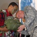 Army Paratrooper Demonstrates Parachute Rigging at Public Service Event