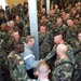 Rumsfeld Visits Kosovo Troops, Dons Army PT Jacket