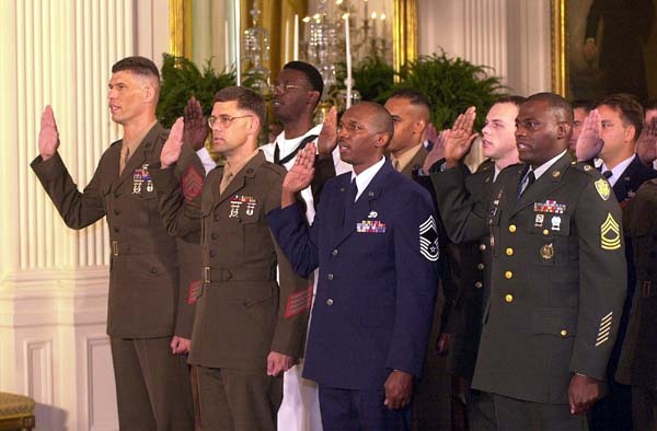 100 Troops Reaffirm Commitment to Service at White House Ceremony