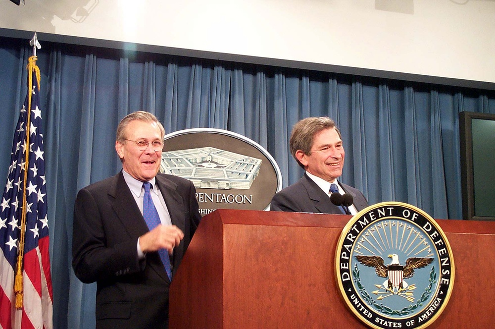 Rumsfeld and Wolfowitz Share Lighthearted Moment at Pentagon Briefing