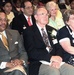 Retired Army Couple Honored for Service at Women's History Month Ceremony