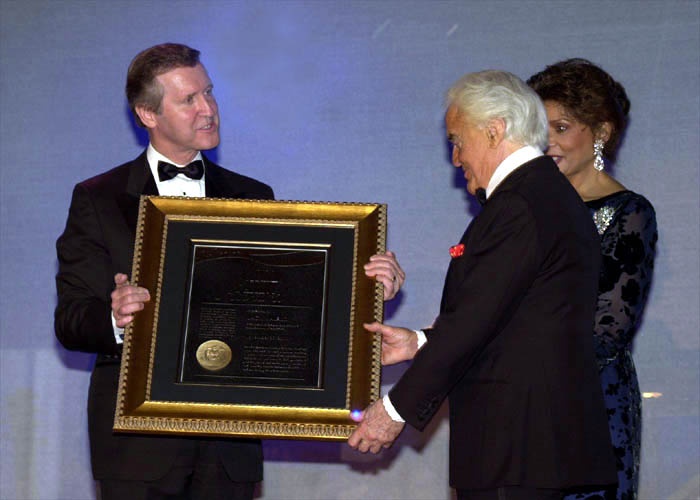Defense Secretary Honors Film Industry Leader for WWII Service, Military Support
