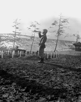 Marine Bugler Sounds 'Taps' at Fallen Leathernecks' Graves in Korea