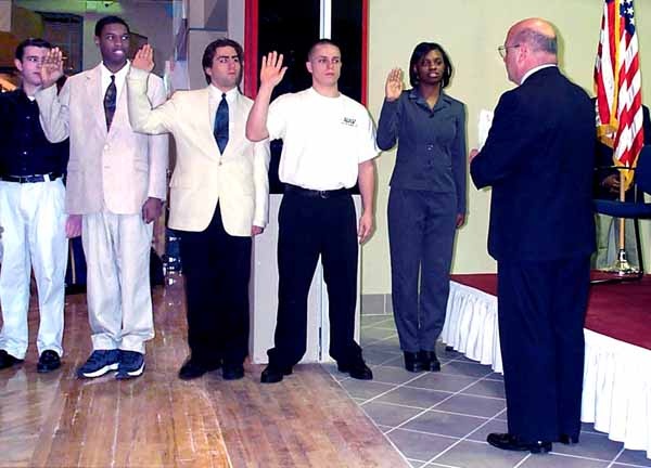 Defense Official Swears in New Military Recruits at Potomac Mills Mall