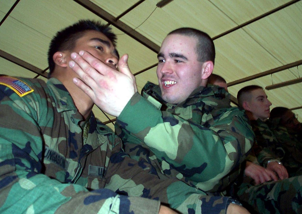 Soldiers Enjoy Cheerleaders' Performance in Kosovo