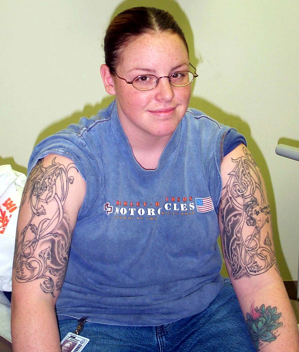 Navy Petty Officer Displays Extensive Tattoos
