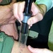 Army Doctor Removes Tattoo from Soldier's Knee Using Laser