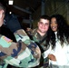 Soldier Poses with MTV Veejay Ananda Lewis During USO Tour