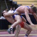Chinese Wrestler Battles Finnish Opponent in Greco-Roman Match