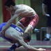 Turkish Wrestler Cerpiz Papagan Attempts Throw Against Greek Opponent Efstathios Theodosiadis at 2000 CISM Military World Wrestling Championship