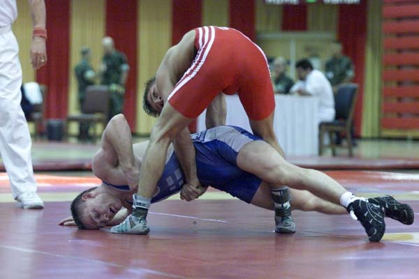 German Lifter Competes Against Finnish Opponent at 2000 CISM Military World Championship
