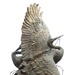 Cranes Struggle for Freedom in Powerful Memorial Sculpture