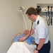 Air Force Officer Practices Medical Diagnosis at Simulation Center