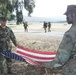 Marines Fold American Flag at Sunset During Exercise in Tunisia