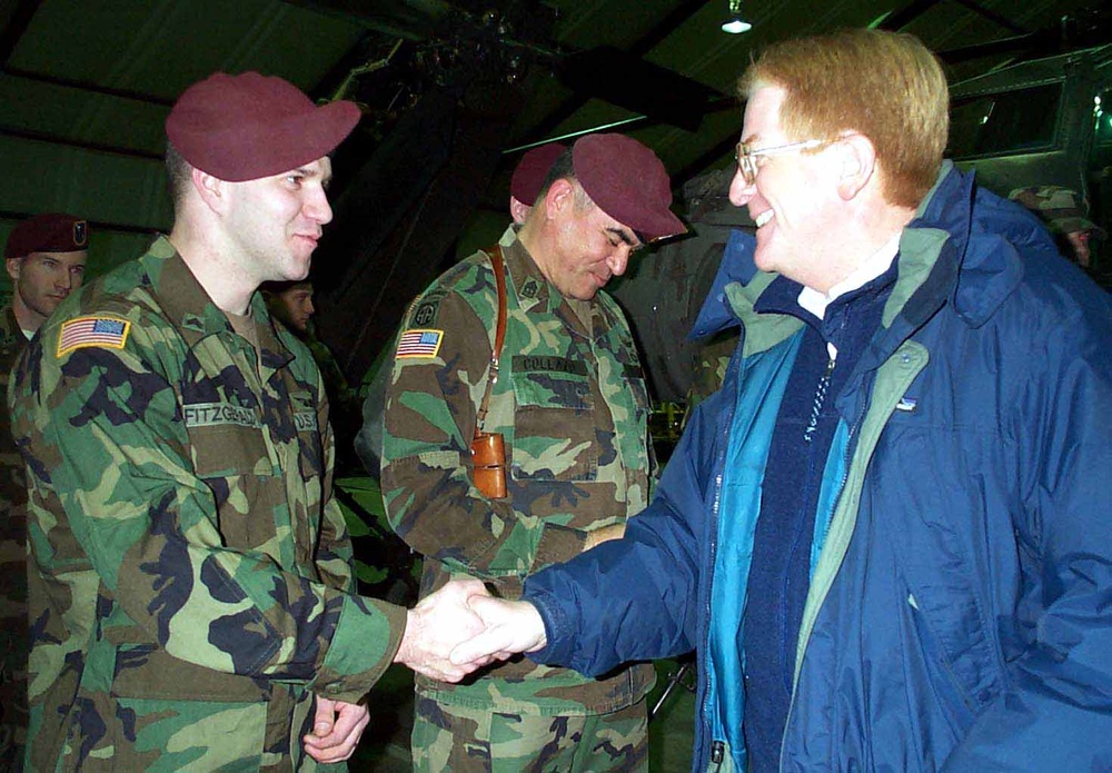 Army Sgt. Receives Commemorative Coin from Deputy Defense Secretary in Bosnia