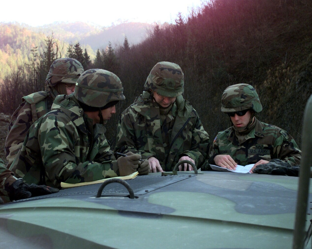 Explosives Ordnance Demolition Team Prepares to Dispose of Weapons in Bosnia