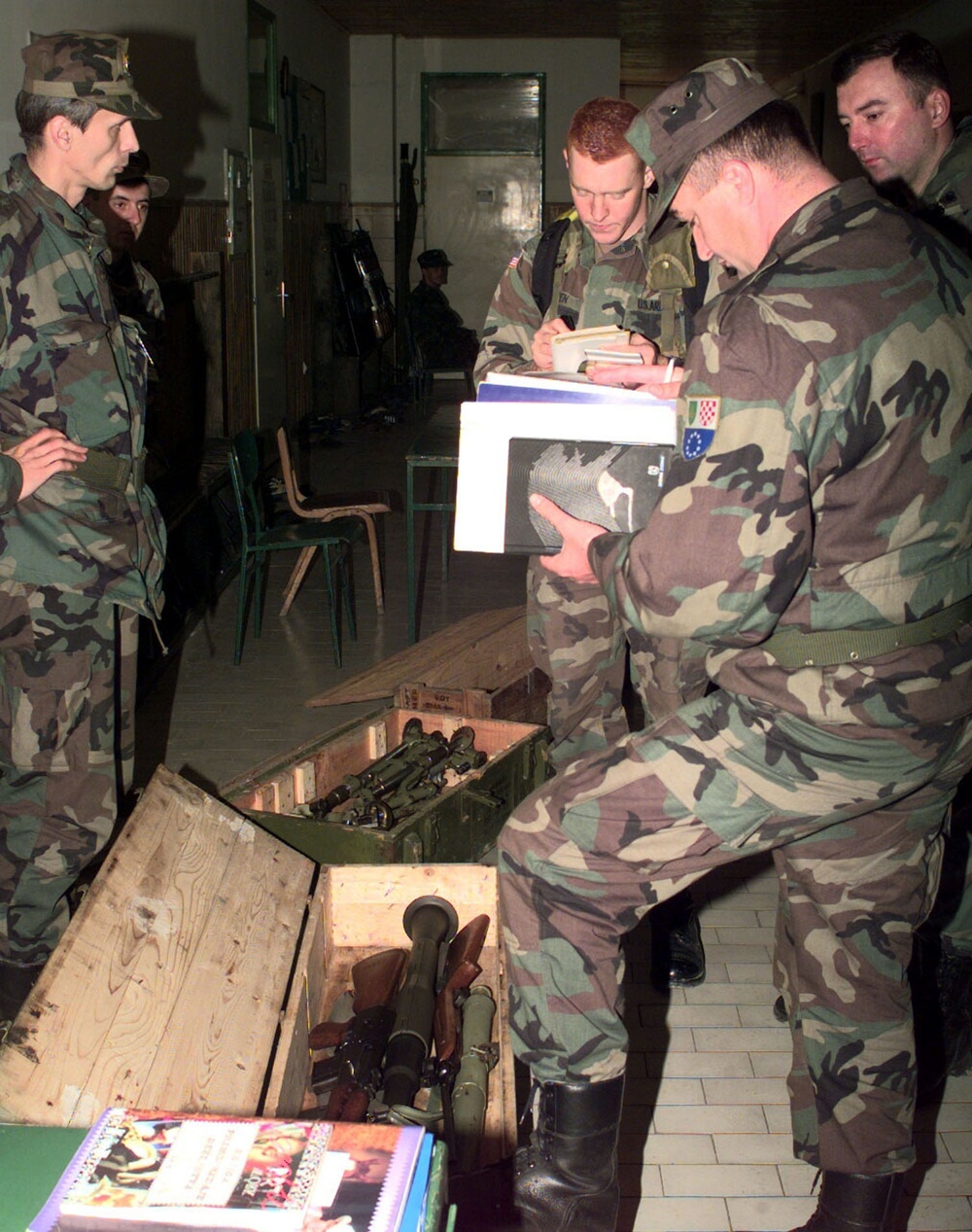 3rd Infantry Division Soldiers Inspect Small Arms Cache in Bosnia