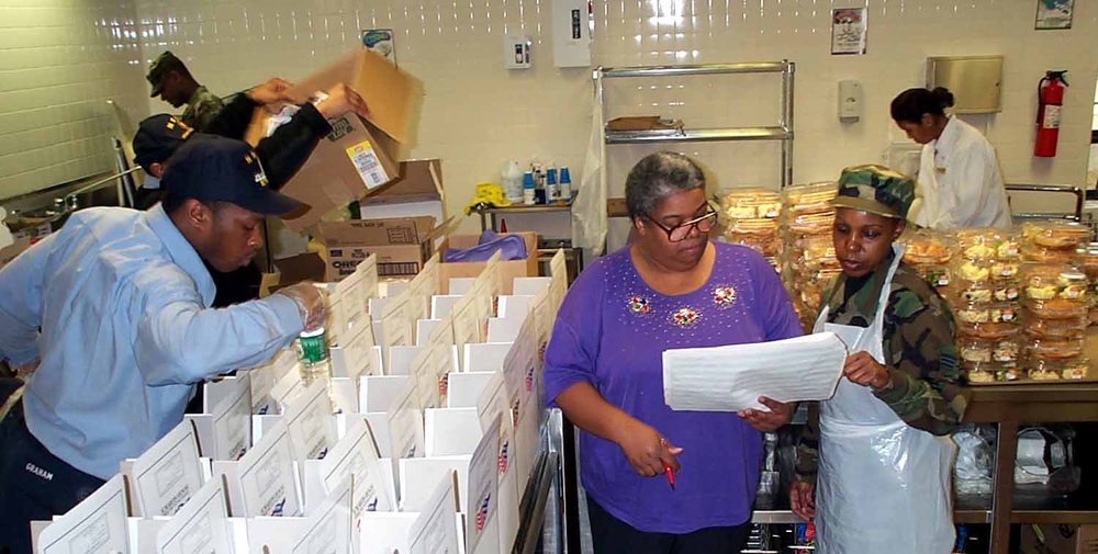 Airman Discusses Lunch Menu with Kitchen Manager at Andrews Air Force Base
