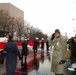 Military Members Salute as Oversized Flag Marches Down Pennsylvania Avenue