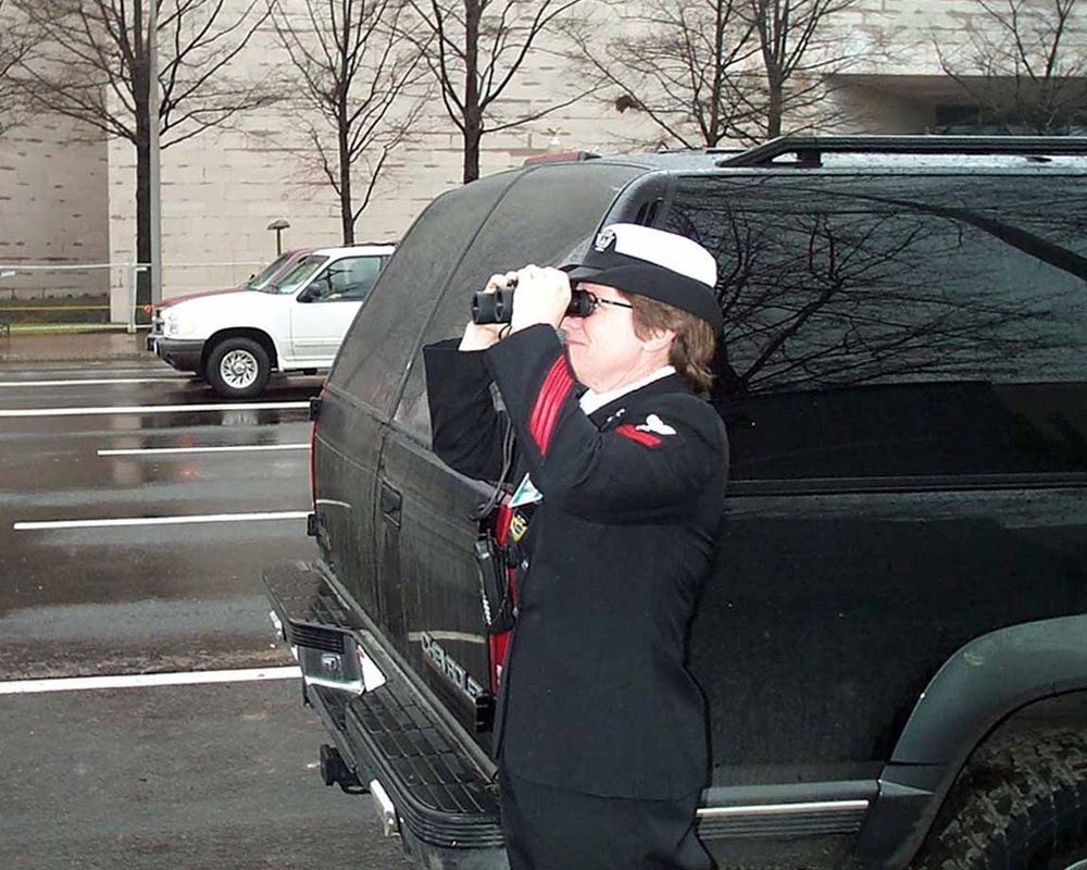 Naval Reserve Petty Officer Watches Bush Inauguration