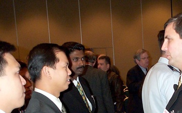 Singapore Air Force Officers Meet with U.S. Defense Official at Personnel Recovery Conference