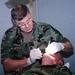 Army Surgeon General Pitches In During Soldier Readiness Processing