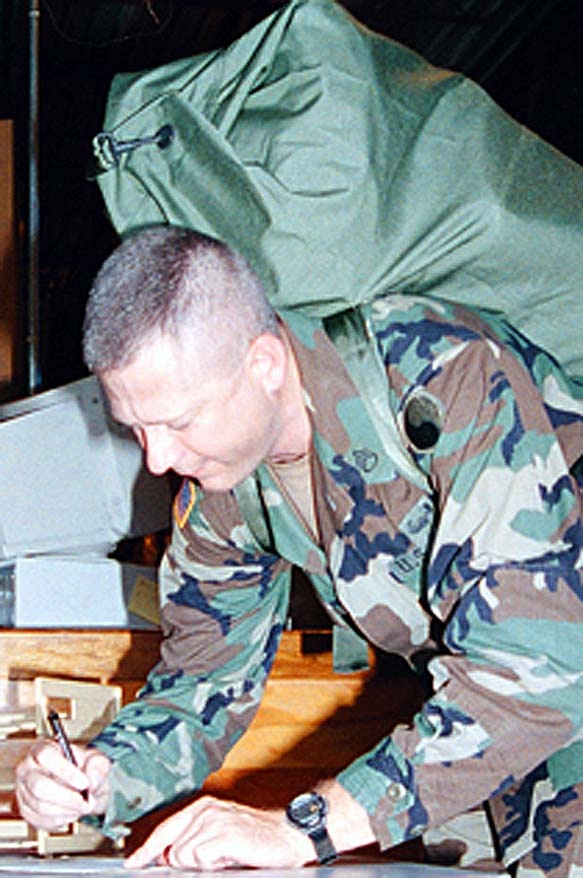 Soldier Prepares for Bosnia Deployment at Fort Dix