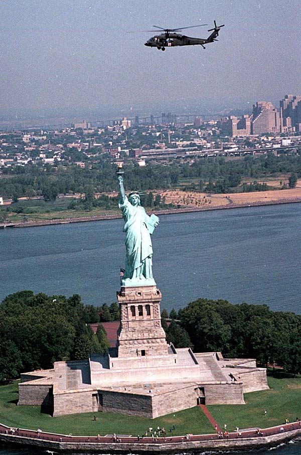 UH-60 Helicopter from 498th Medical Company Flies Over Statue of Liberty en Route to Bosnia