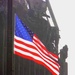 American Flag Flies Defiantly Over Ruins of 9/11 Attack