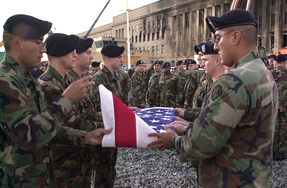Soldiers Fold Flag Recovered from Pentagon Disaster Site