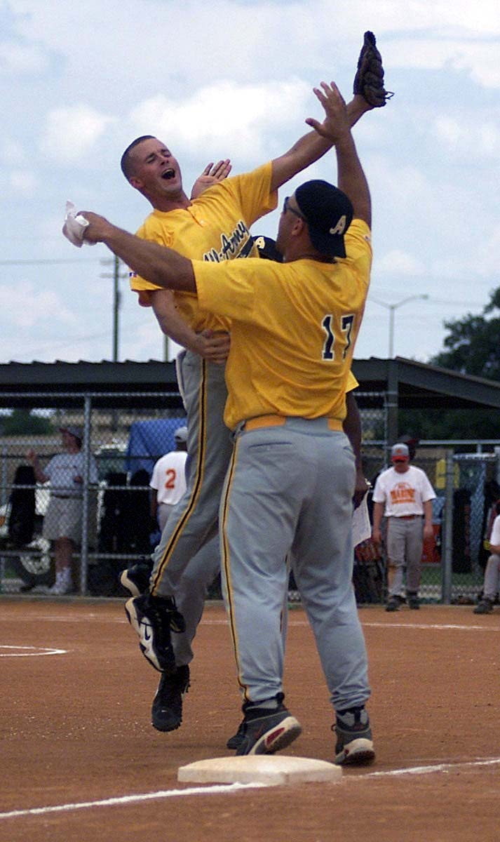 Army Softball Team Celebrates Victory Over Marines at Armed Forces Tournament