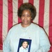 Grieving Sister Holds Photo of 9/11 Victim