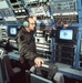 Air Force Crew Member Adjusts Transmission During EC-130E Training Mission