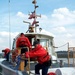 Coast Guard Petty Officer Prepares Patrol Boat for Next Mission