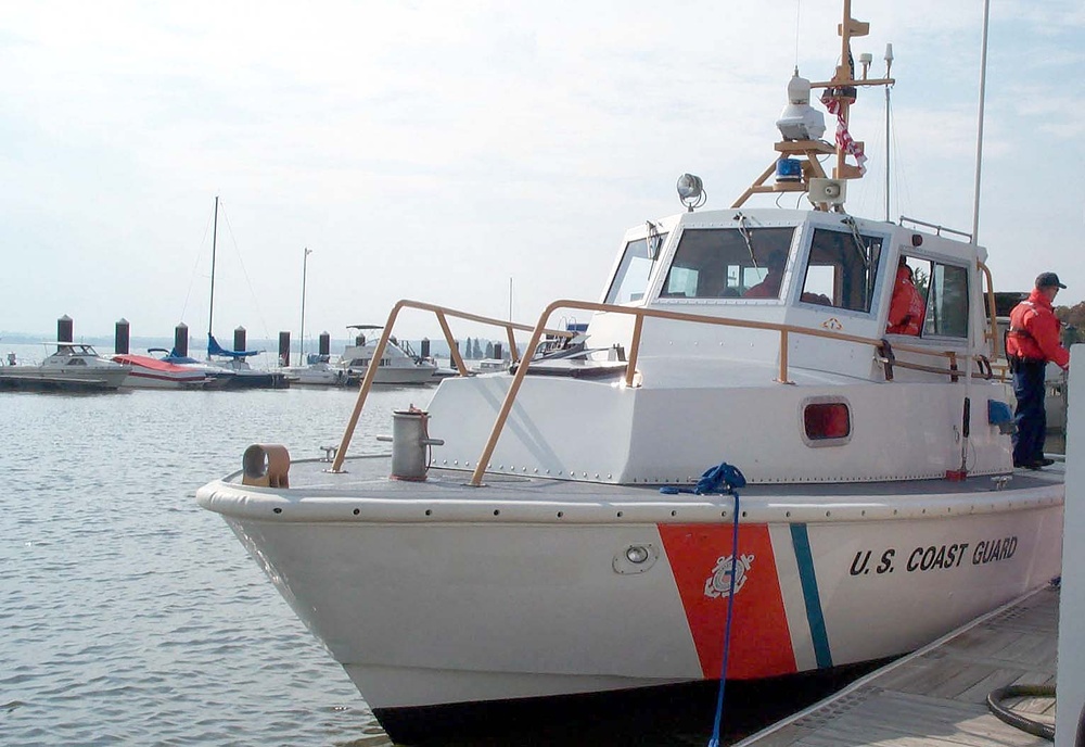 Coast Guard Petty Officers Converse in Patrol Boat at D.C. Marina