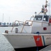 Coast Guard Petty Officers Converse in Patrol Boat at D.C. Marina