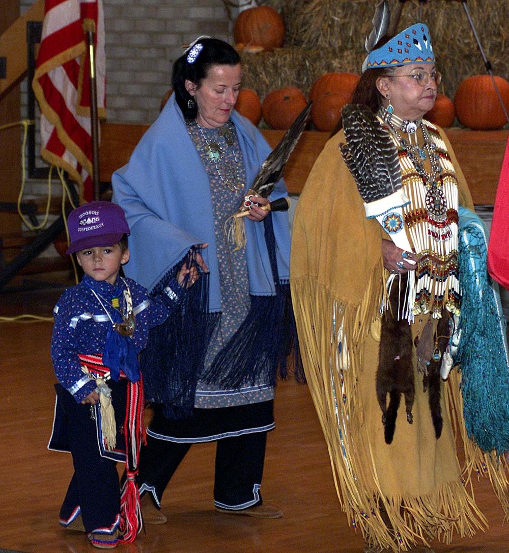 Veterans Powwow Features Young Dancer Guided by Women