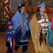 Veterans Powwow Features Young Dancer Guided by Women