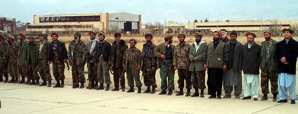 Rumsfeld Visits Bagram Air Base Amid Rubble and Destruction