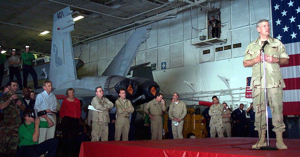 Top Military Leader Visits Troops Aboard Aircraft Carrier